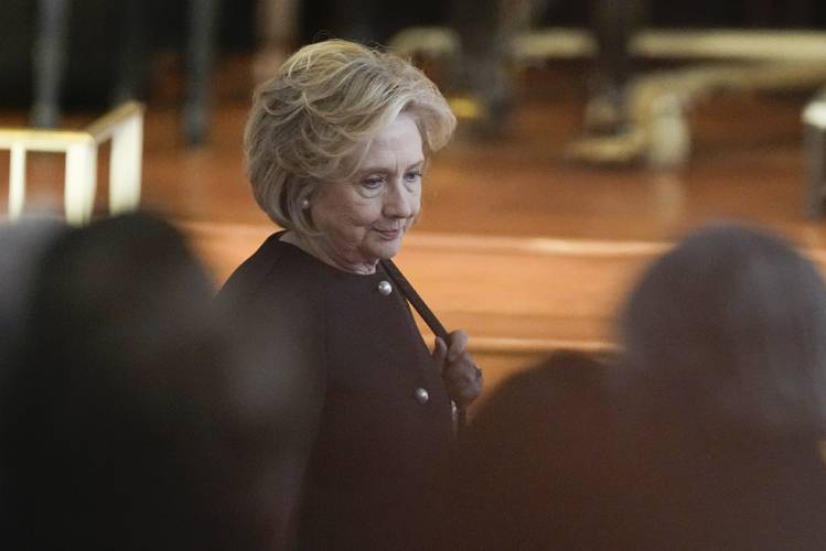 Former Secretary of State Hillary Clinton arrives before a tribute service for former first lady Rosalynn Carter at Glenn Memorial Church at Emory University on Tuesday, Nov. 28, 2023, in Atlanta. (AP Photo/Brynn Anderson, Pool)
