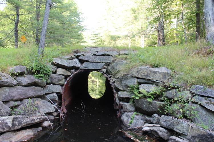 The culvert that runs the King Brook underneath the West Hawley Road (Route 8A) in Hawley is shown in August 2022.