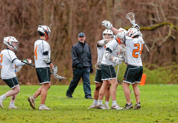 Belchertown players celebrate a goal by Landon Andre in the fourth quarter against Amherst on Thursday in Belchertown.