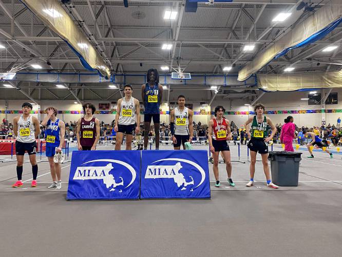 Hampshire's Nick Brisson (5191) receiving his medal after placing fifth in the 1,000 at the MIAA Div. 5 State Indoor Track Championship at the Reggie Lewis Center in Boston.