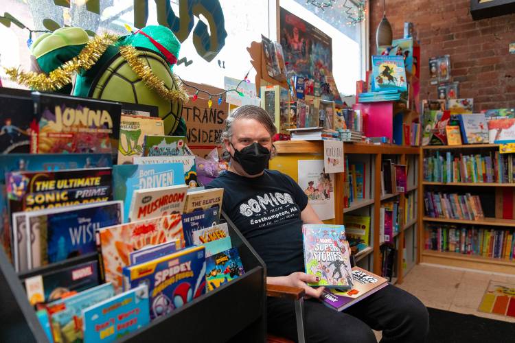 Owner Chris W.Z. Reader on Tuesday afternoon at Comics N’More in Easthampton.
