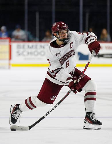 UMass captain Ryan Ufko (6) fires a shot against AIC earlier this season at the Mullins Center in Amherst. Ufko and the Minutemen will play top-seeded Boston College in the semifinals of the Hockey East Tournament on Friday at 4 p.m.