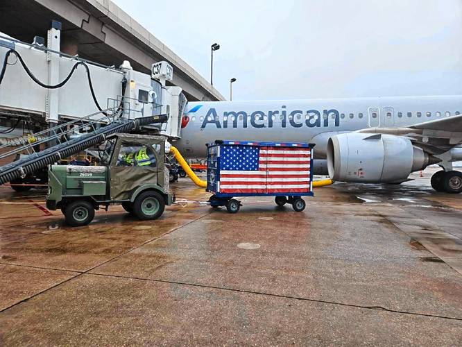 The coffin bearing Merle Hillman’s remains is loaded into a plane Wednesday in Honolulu. The Holyoke resident is coming home 82 years after he died in the earliest moments of Japan’s surprise prewar aerial attack on the American fleet at Pearl Harbor on Dec. 7, 1941. 
