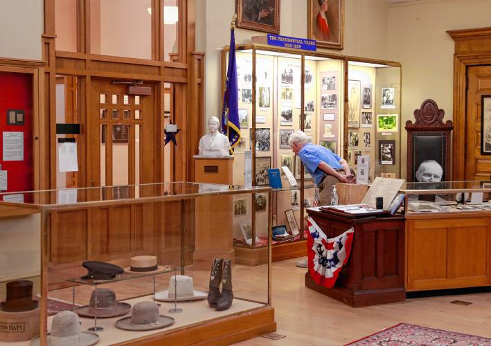 A visitor peruses the exhibits at the Calvin Coolidge Presidential Library and Museum at Forbes Library in Northampton.