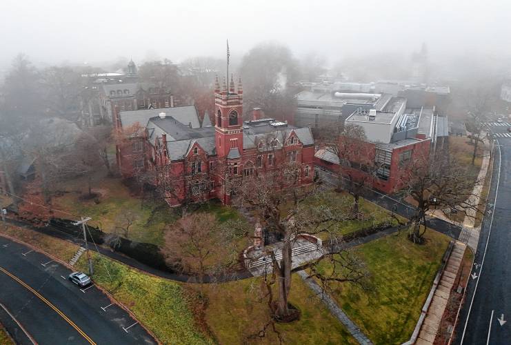 Fog rolls in over College Hall on the Smith College campus.