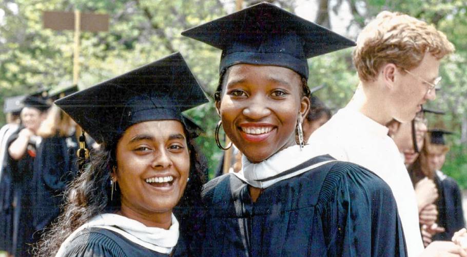Thilo Simadari, left, and Thembekile Mazibuko celebrate their graduation from Smith College in 1989 in a scene from the documentary “Where I Became.” They were the first two South African scholarship students to come to Smith.