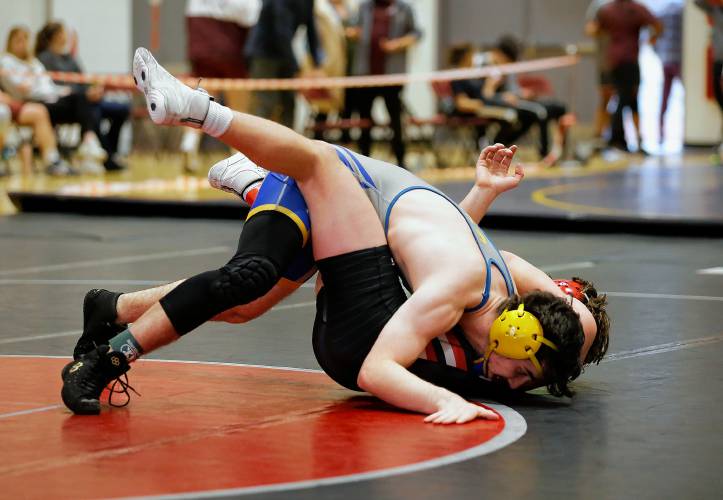 Gateway’s Eli Gilbert, top, works to pin Hampshire Regional’s Luke Johndrow in the 165-pound final Saturday during the MIAA Division 3 Western Mass wrestling championships at Mount Greylock Regional School in Williamstown. 