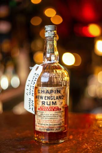 An antique bottle of 1917 Chapin New England rum at Gigantic bar in Easthampton.
