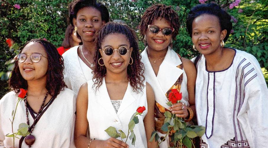 South African students Nolwandle Mgoqi, far left, and Tandiwe Njobe, at right, at their 1994 graduation from Smith College. Njobe is the co-producer of the documentary “Where I Became.”