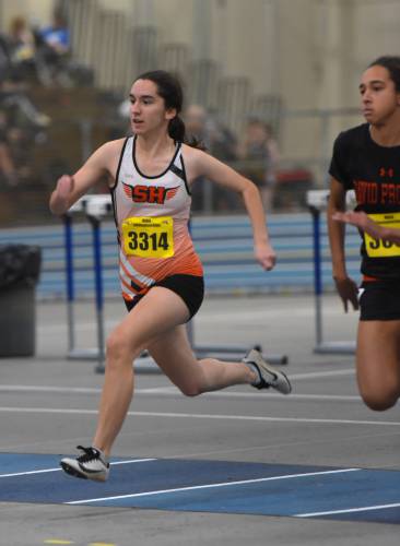 South Hadley’s Abigail Gelinas competes at the MIAA Division 5 Indoor Track & Field Championships last winter at the Reggie Lewis State Track Athletic Center in Boston.