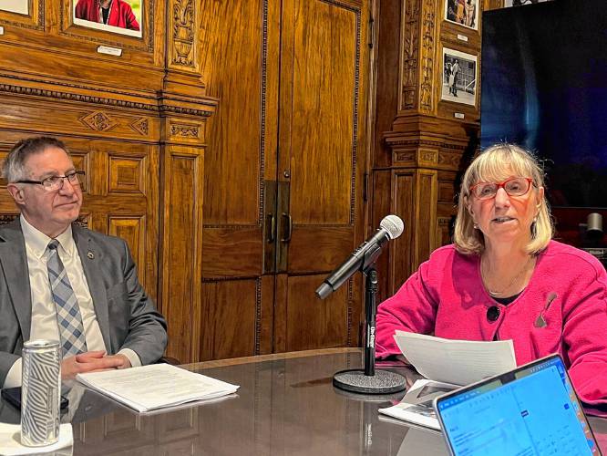 Senate President Karen Spilka, right, and Senate Ways and Means Chair Michael Rodrigues discuss a new report about making community college free for all.