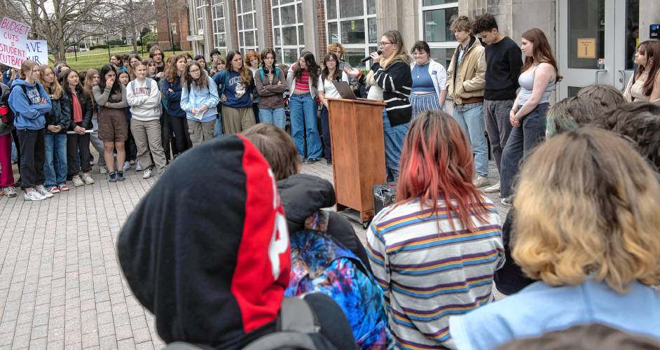Northampton High School students  protest proposed budget cuts in front of the school on Monday afternoon. The School Committee and Superintendent Portia Bonner later spent considerable time discussing the school budget at a meeting later that night.  