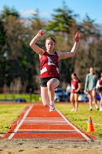 Easthampton’s Morgan Wijnhoven competes in the long jump Tuesday during their meet against Belchertown at Mountain View School in Easthampton.