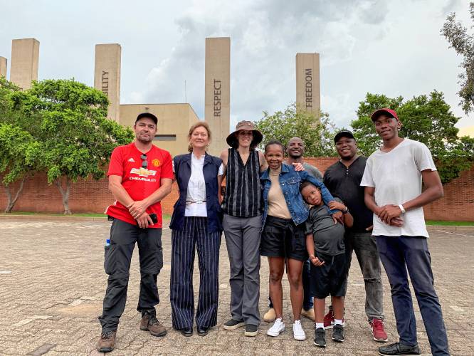 At the Apartheid Museum in Johannesburg, South Africa are “Where I Became” film crew members including, second from left, co-producer Jane Shang; director Kate Geis; and co-producer Tandiwe Njobe with her son, Nkosana.