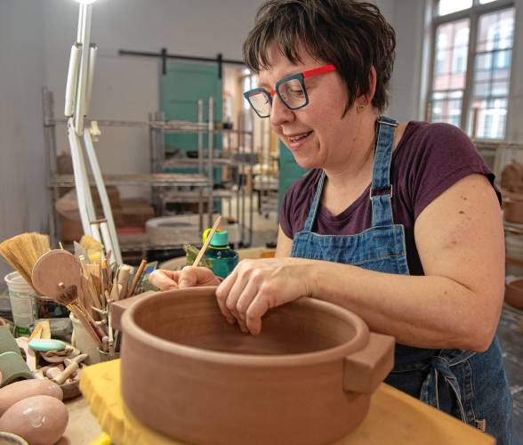 Tiffany Hilton works in her Florence studio, where she also teaches courses. She’s one of eight regional pottery hosts, and 21 visiting artists, who will be part of the Asparagus Valley Pottery Trail April 27-28.