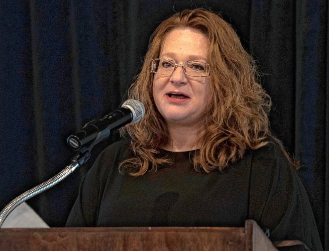 Kellie Beaulieu, child abuse unit coordinator at the Northwestern District Attorney’s Office, speaks after receiving the Linda L. Pisano Award of Excellence at the Children’s Advocacy Center of Hampshire County’s breakfast on Friday morning.