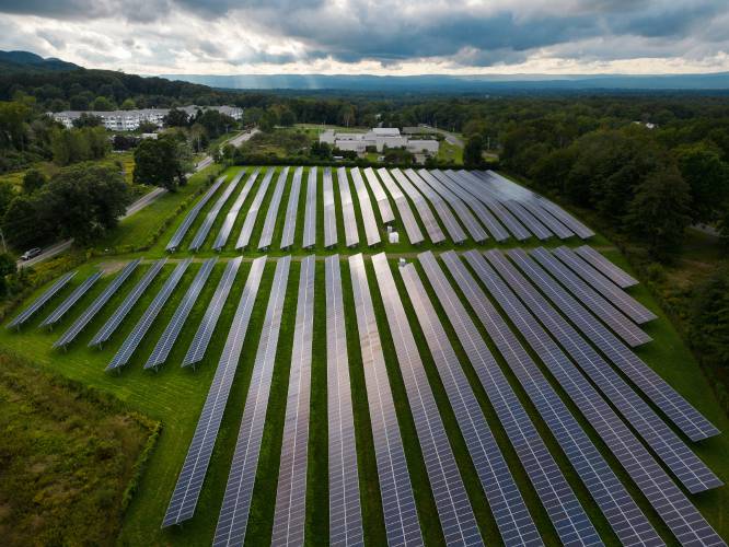 A field of solar panels along West Bay Road in Amherst. On Monday, Gov. Maura Healey’s Commission on Clean Energy Infrastructure Siting and Permitting laid out its recommendations in a new report. 