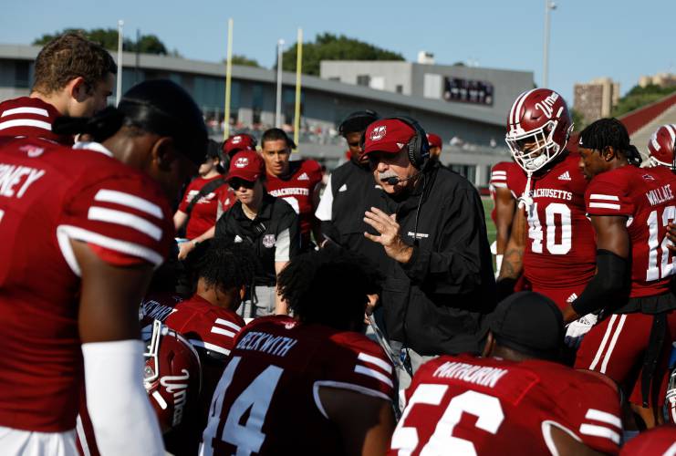 UMass coach Don Brown talks to his team during a past game at McGuirk Alumni Stadium in Amherst. 