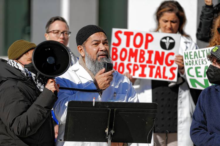 Neurologist Dr. Mohammad Ali Hazratji speaks as dozens of area health care workers rallied outside U.S. District Court in Springfield on Tuesday to demand that U.S. Rep. Richard Neal join their call for an immediate cease-fire in Gaza.