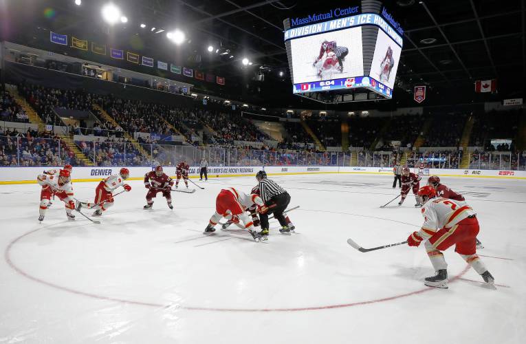 UMass players face off against Denver in the second period of the opening round of the NCAA tournament Friday at the MassMutual Center in Springfield.