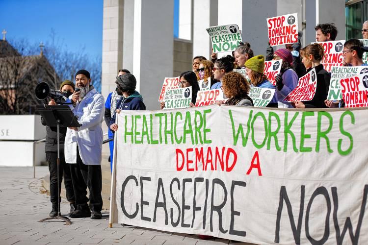 Neurologist Dr. Mohammad Ali Hazratji speaks as dozens of area health care workers rally outside U.S. District Court in Springfield on Tuesday to demand that Congressman Richard Neal join their call for an immediate cease-fire in Gaza.