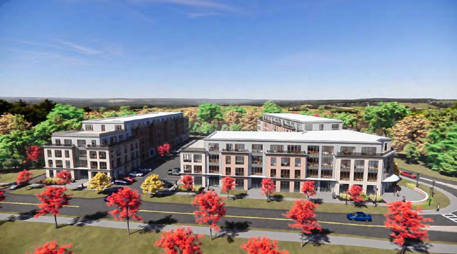 An aerial rendering of potential 422 Amity Street mixed-use project at the intersection of University Drive and Amity Street in Amherst, looking west toward Hadley.
