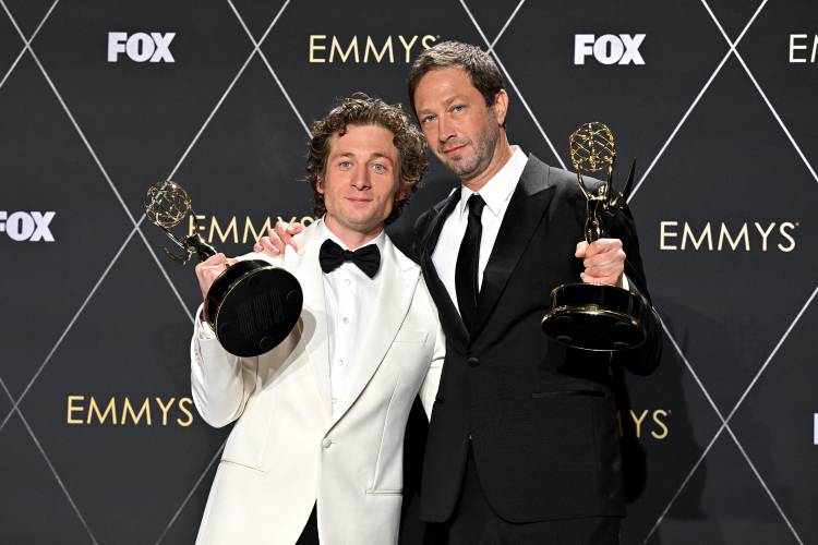Outstanding supporting actor in a comedy series Ebon Moss-Bachrach, right, a native of Amherst, and outstanding lead actor in a comedy series Jeremy Allen White for “The Bear” pose in the press room during the 75th Emmy Awards in Los Angeles on Monday. 