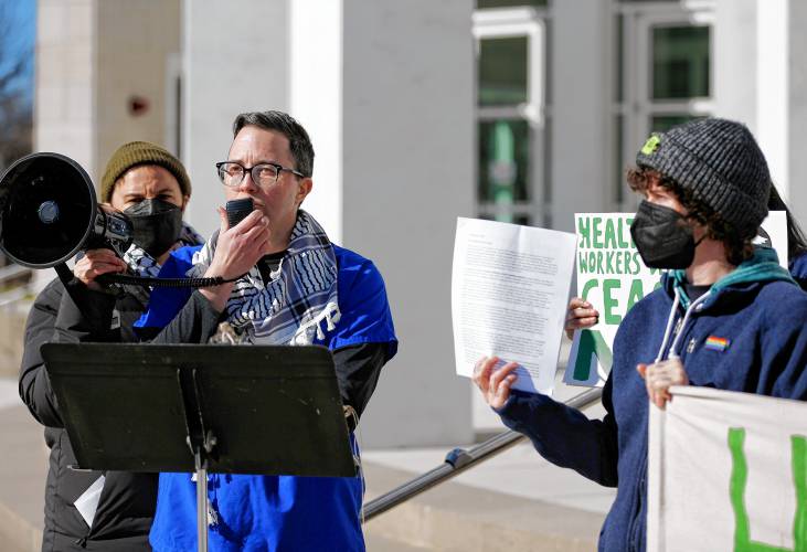 Ryan Pryor, a family nurse practitioner, speaks during a rally by area health care workers outside U.S. District Court in Springfield on Tuesday to demand that Congressman Richard Neal join their call for an immediate cease-fire in Gaza.