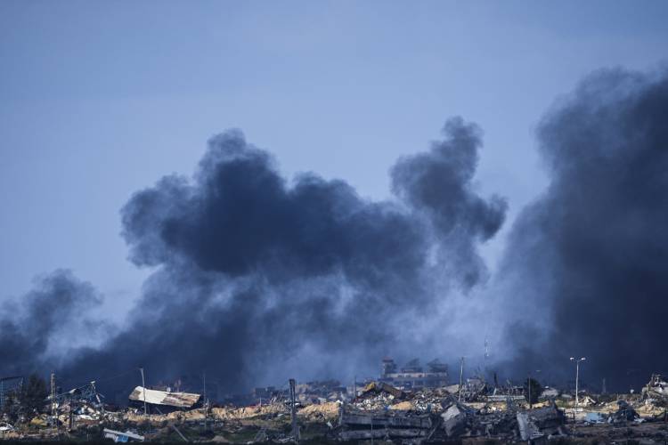 Smoke rises following an Israeli bombardment in the Gaza Strip, as seen from southern Israel, Tuesday, Jan. 30, 2024. 