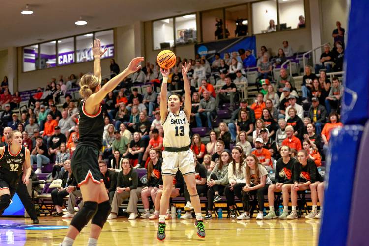 Smith College's Jane Loo takes a shot against Wartburg during the semifinals of the the NCAA Div. III Women's Basketball Championship in Columbus, Ohio, on Thursday. 