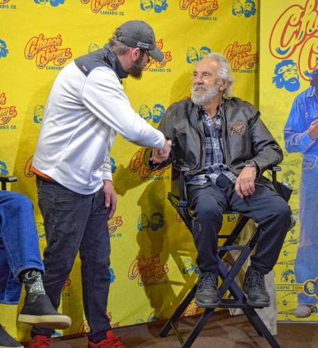 Greg Gottier, of Coventry, Connecticut, meets Tommy Chong at the grand opening of Cheech & Chong’s Dispensoria in Whately on Saturday.